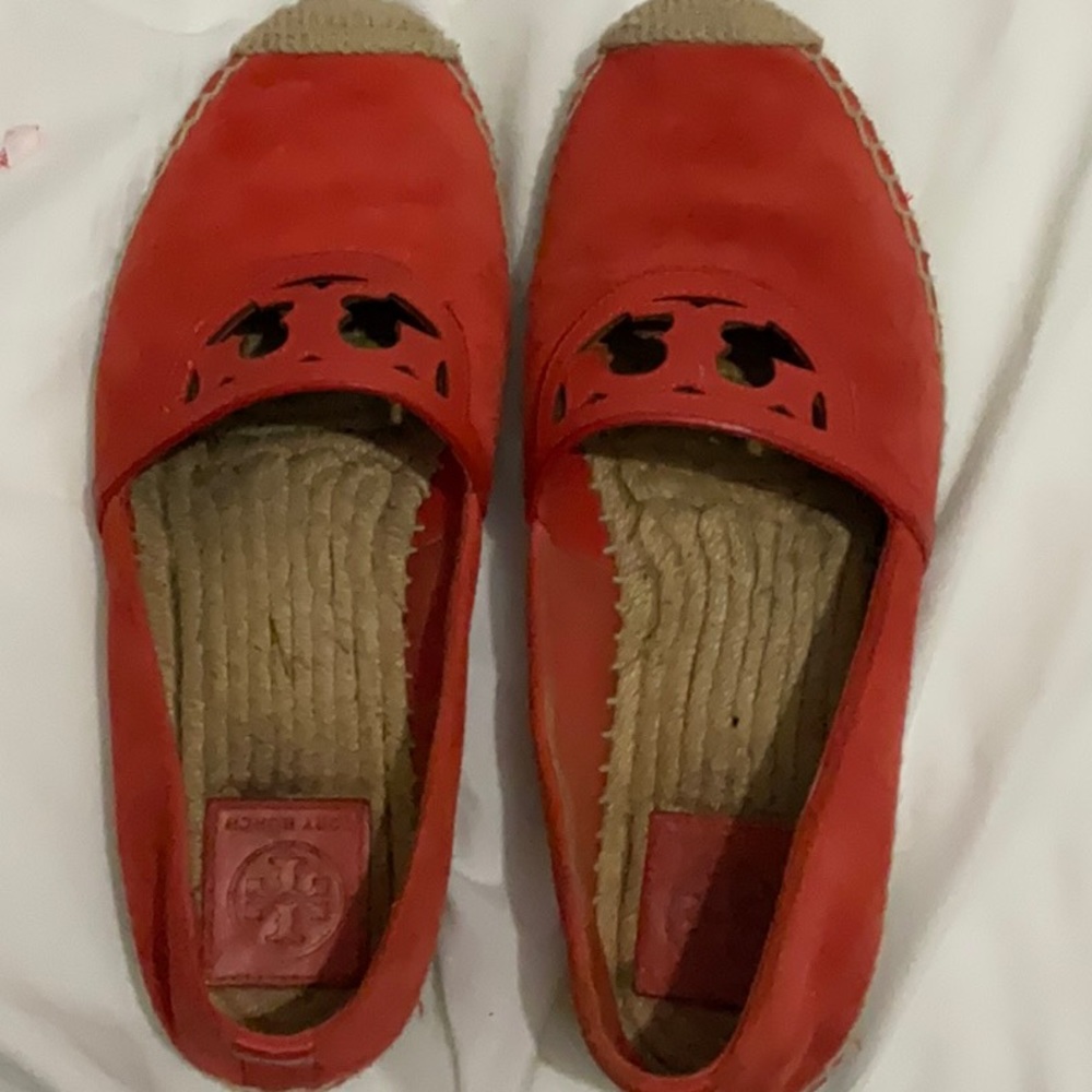 ToryBurch size 7 orange slip ons